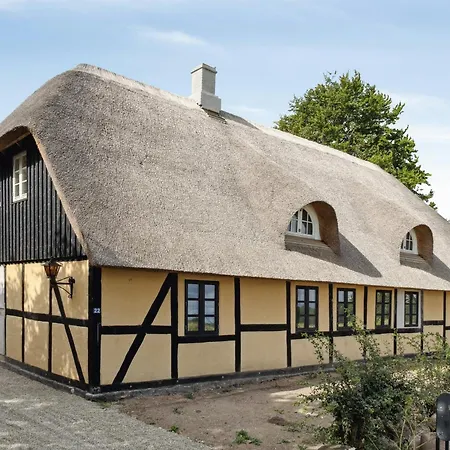 Holiday home Nostalgic Charm In A Yellow Timber House