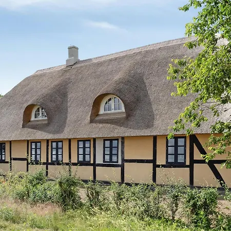 Holiday home Nostalgic Charm In A Yellow Timber House *