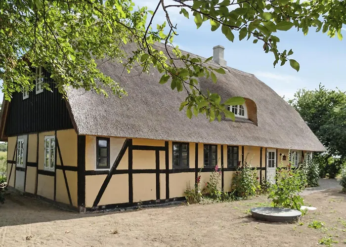 Nostalgic Charm In A Yellow Timber House Sakskobing