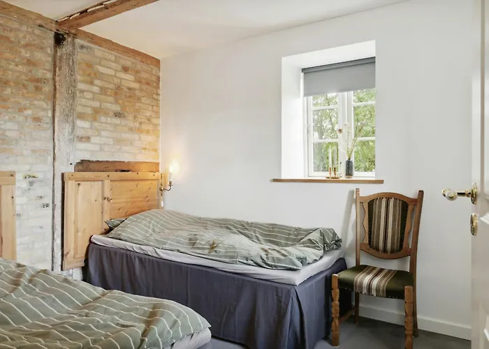 Holiday home Nostalgic Charm In A Yellow Timber House